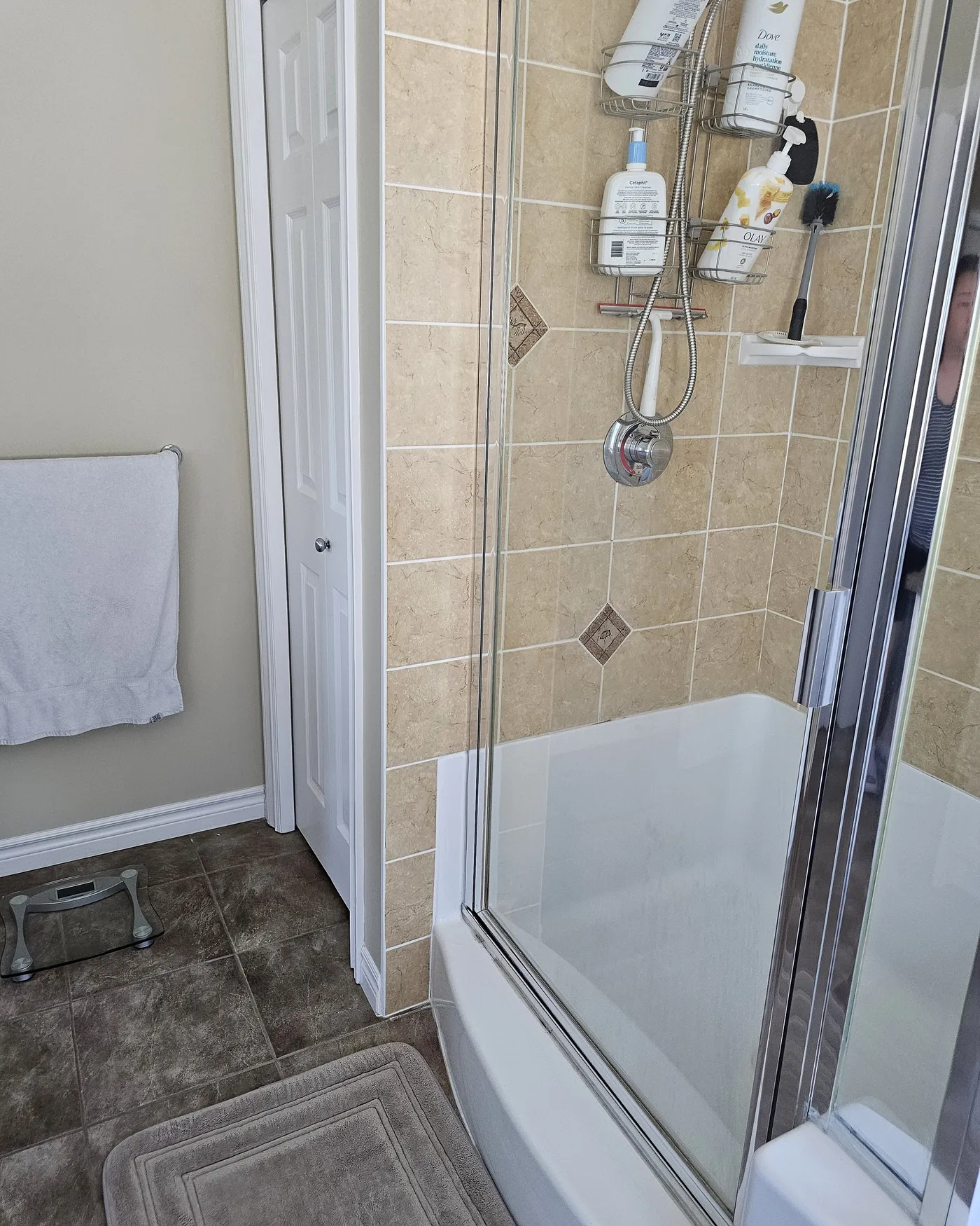 Bathroom renovation in Port Coquitlam by PS Tiling: Shower corner, before.