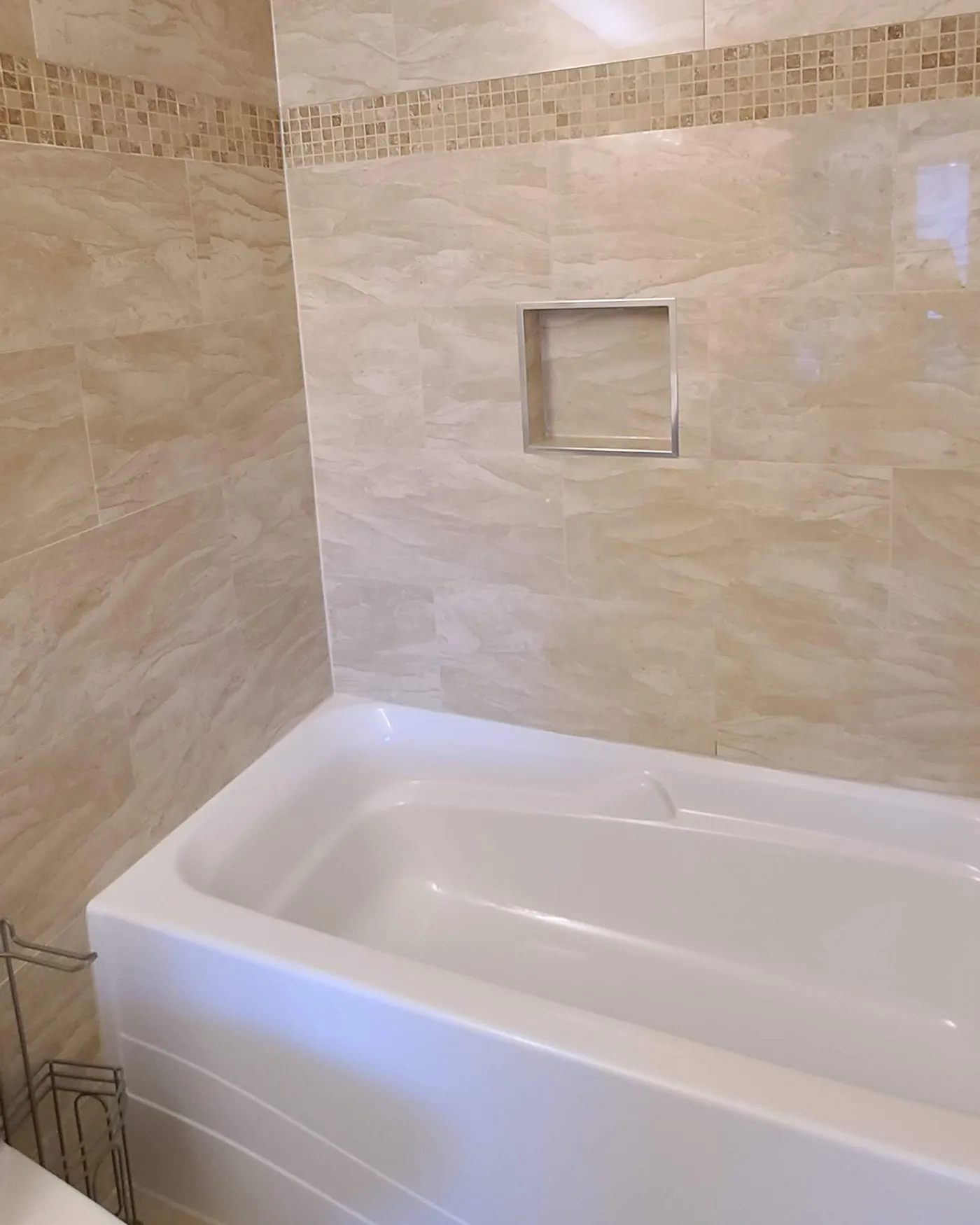 Bathroom renovation in Port Coquitlam by PS Tiling: Tub surround, after.