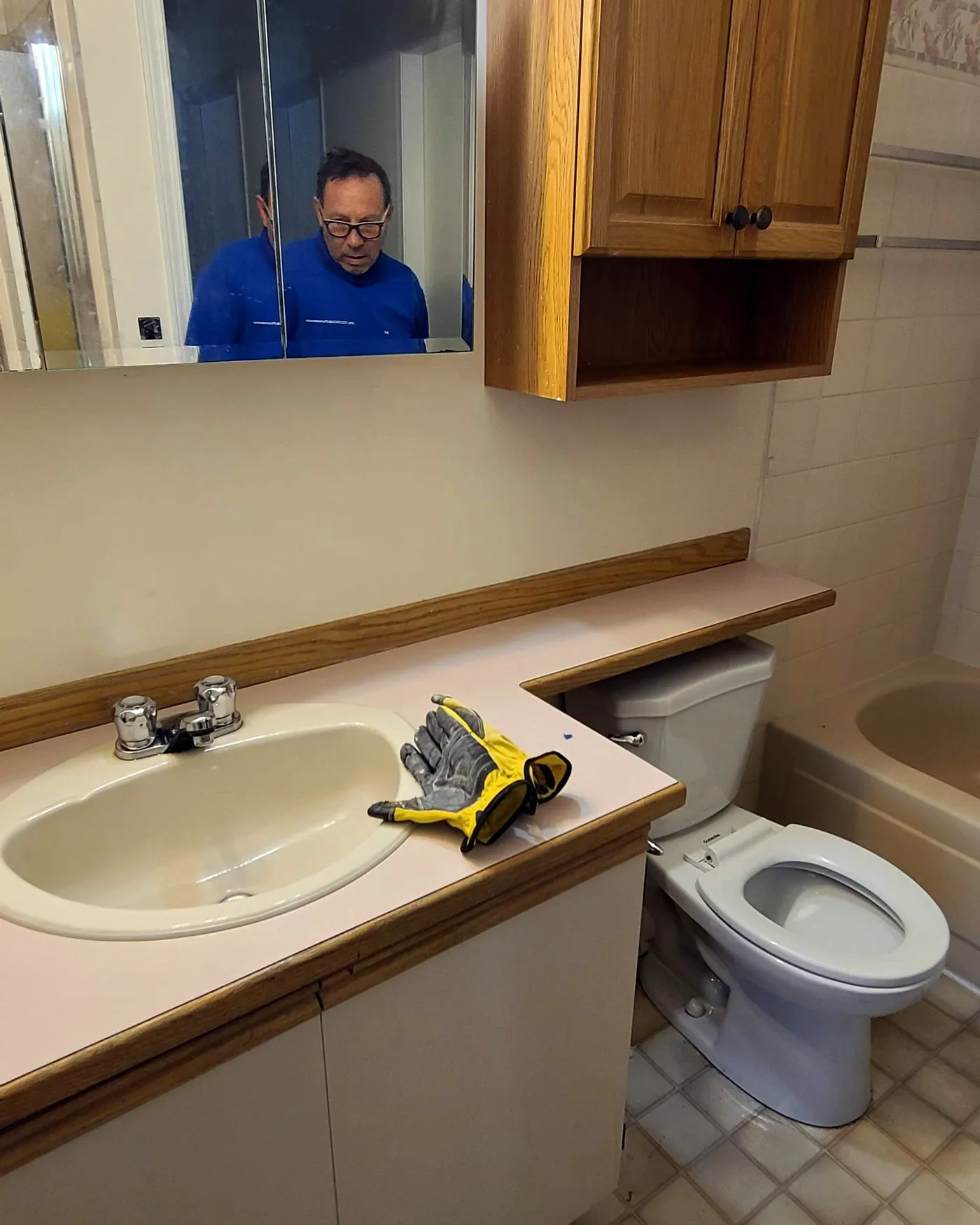 Bathroom renovation in Port Coquitlam by PS Tiling: Vanity, before.