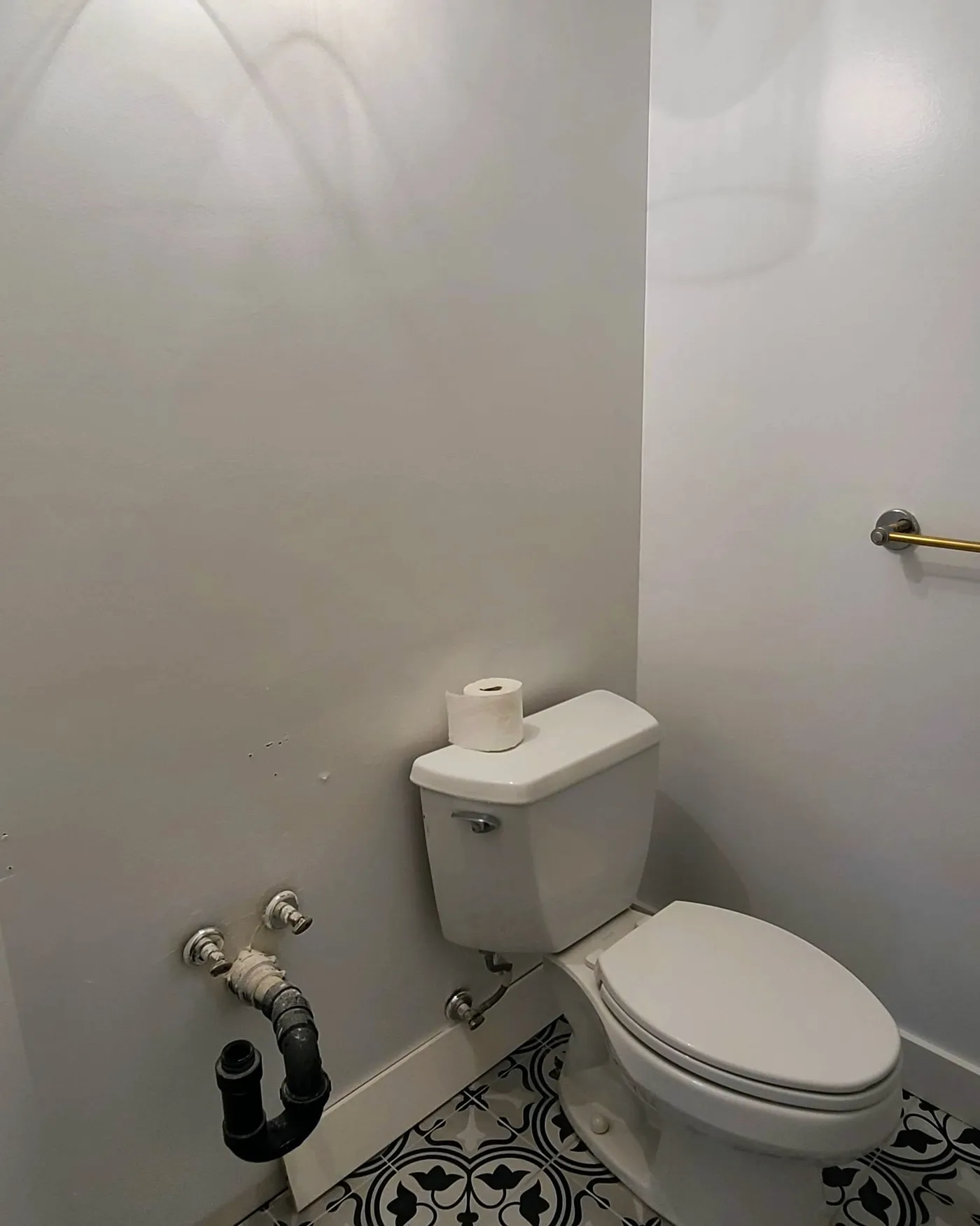 Bathroom renovation in Vancouver by PS Tiling: From the doorway, after.